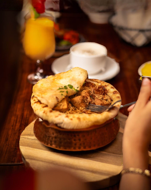 Eat Dum Biryani At India Palace